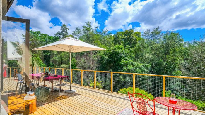 Hoekwil Farm For Sale: Multiple dwellings, private forest, and rental potential.