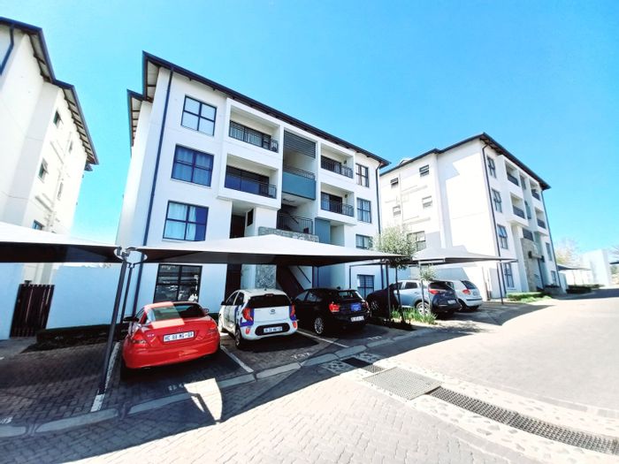 For Sale: Apartment in Modderfontein with pool, secure parking, and scenic views.