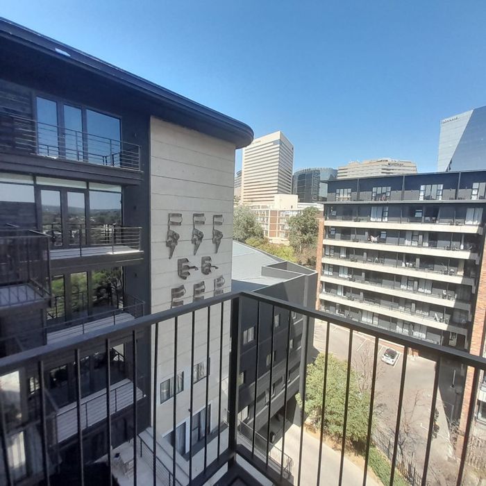 To Rent: Apartment in Sandton Central with amenities for work, leisure, and security.