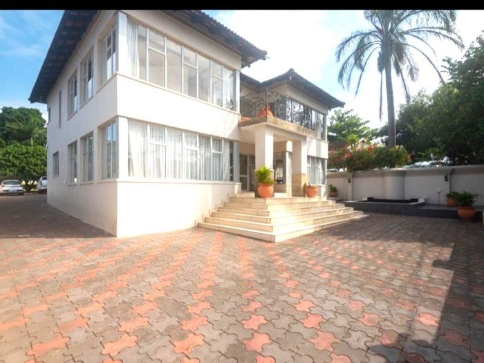 For Sale: Spacious 5-bedroom house in Stanger Manor with 4 garages and security.