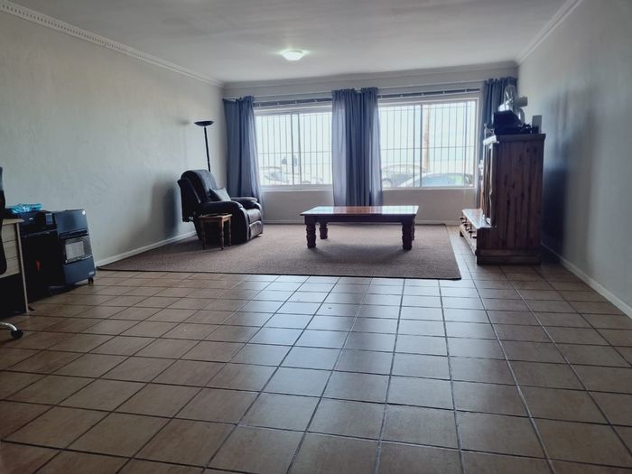 Strand Central Apartment To Rent: 2 Bedrooms, sea views, garage, near swimming area.