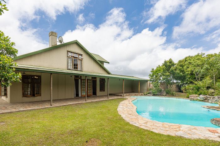 For Sale: Versatile Farm in Paddock with multiple dwellings, pool, and workshops.