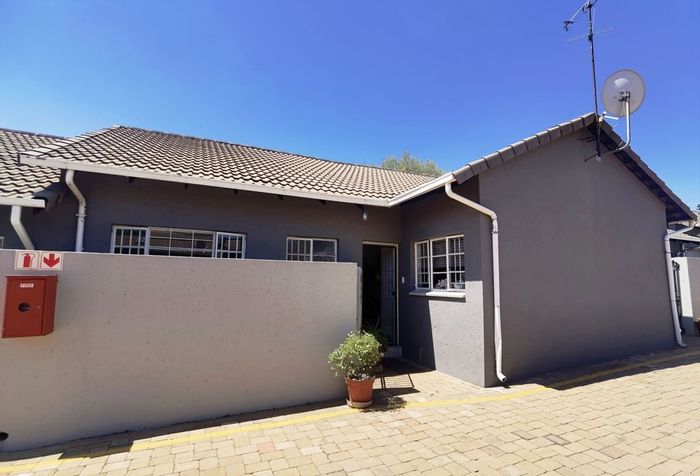 Klopperpark House For Sale: 2 beds, pet-friendly garden, secure complex, garage.