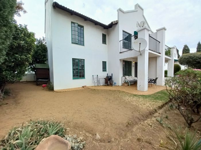 For Sale: Townhouse in Marais Steyn Park with private garden and community pool.