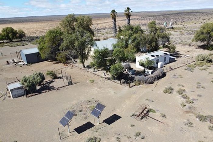 Calvinia Rural Farm For Sale: Spacious land, water access, and livestock facilities.