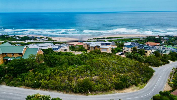 Elevated vacant land in Constantia Kloof, for sale with panoramic views.