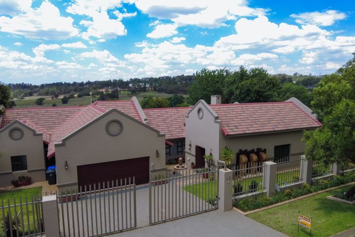 For Sale: House in Modderfontein with pool, garden, double garage, and security.