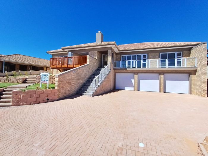 For Sale: House in Reebok with 3 beds, braai area, and mountain views.