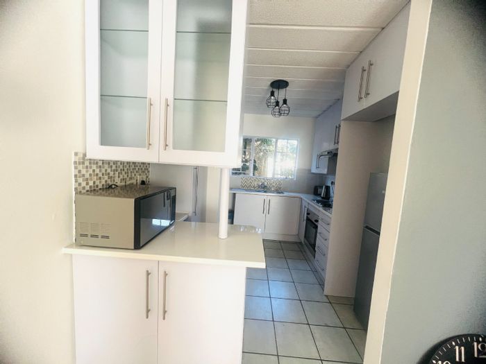 Spacious Highveld Townhouse To Rent with pool, garden, and secure parking.