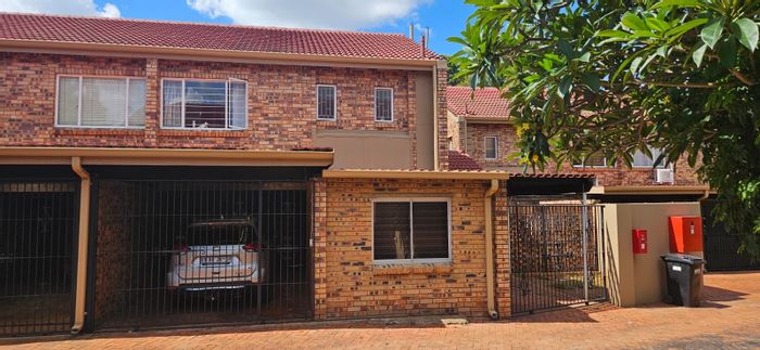 3-Bedroom Townhouse For Sale in Faerie Glen with secure parking and community amenities.