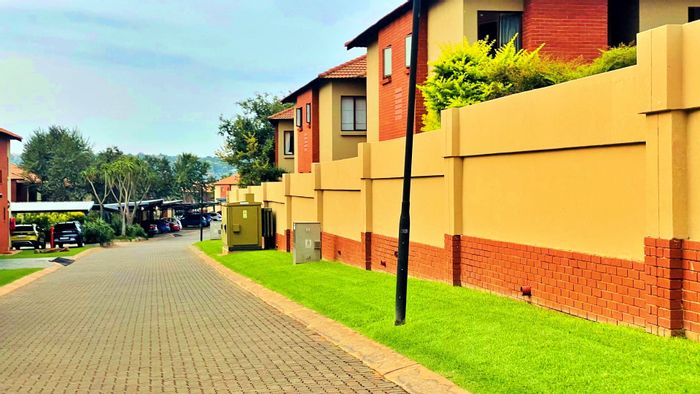 Two Bedroom Apartment For Sale in Pretoriuspark with pool, security, and balcony.