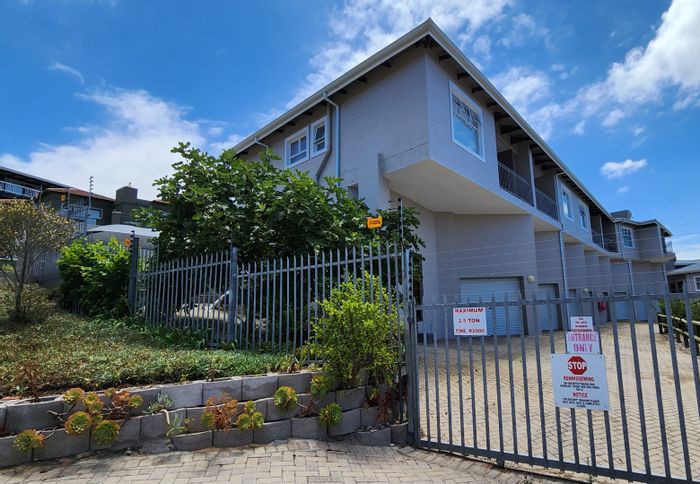 Island View Apartment For Sale: 2 beds, balcony, built-in braai, secure parking.