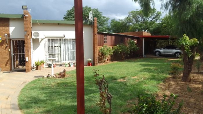For Sale: House in Hennenman Central with spacious garden, solar, and entertainment area.