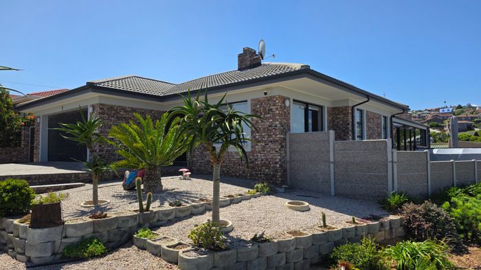 Dana Bay House For Sale: Sea views, spacious living, solar system, and double garage.