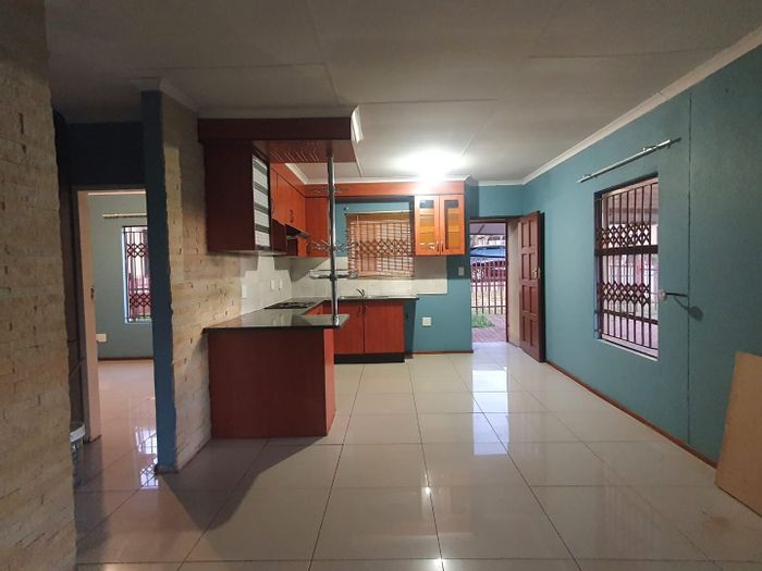 Townhouse for Sale in Pretoria North: 2 beds, secure complex, open plan living.