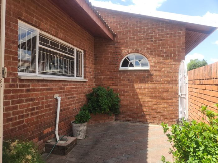 For Sale: Apartment in Standerton Central with 3 bedrooms, secure parking, and outdoor space.