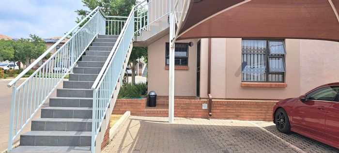 Ground floor apartment in The Reeds with private patio and estate amenities. For Sale.