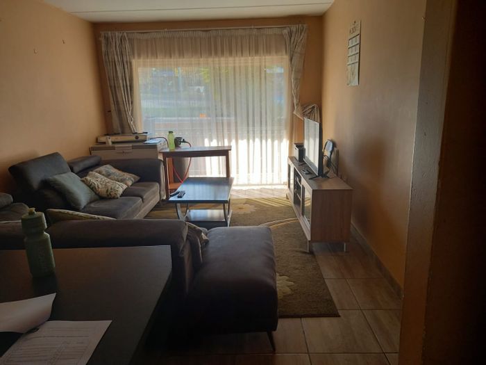 For Sale: Birchleigh Apartment with 2 beds, 2 baths, carports, and security.