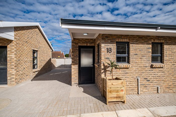 For Sale: Townhouse in C Place with secure complex, private yard, and parking.