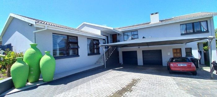 For Sale: Spacious Dana Bay house with ocean views, flatlets, and ample parking.
