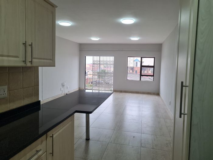 3-Bedroom Apartment To Rent in Lenasia Ext 13, includes Masjid, secure parking.
