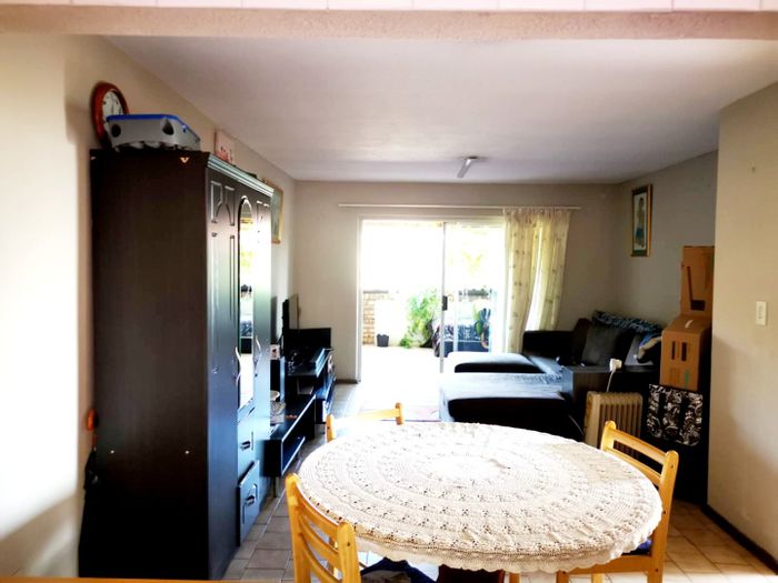 3-bedroom apartment for sale in Northcliff, featuring open plan living and security.