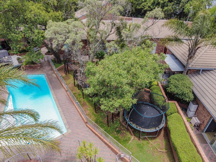 Bryanston House For Sale: 14 garages, cottages, gym, squash court, and pool.
