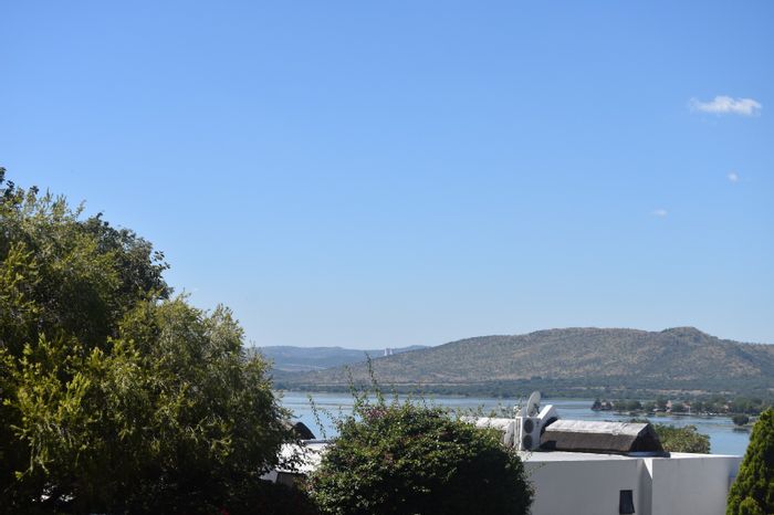 Hartbeespoort Rural Apartment To Rent: 2 Bedrooms, scenic views, private garden, secure parking.