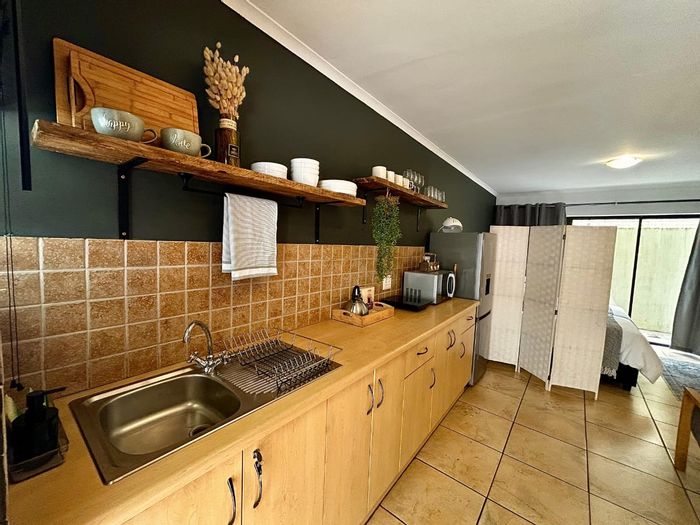 For Sale: Apartment in Ferreira Town, steps from beach, shops, and restaurants.