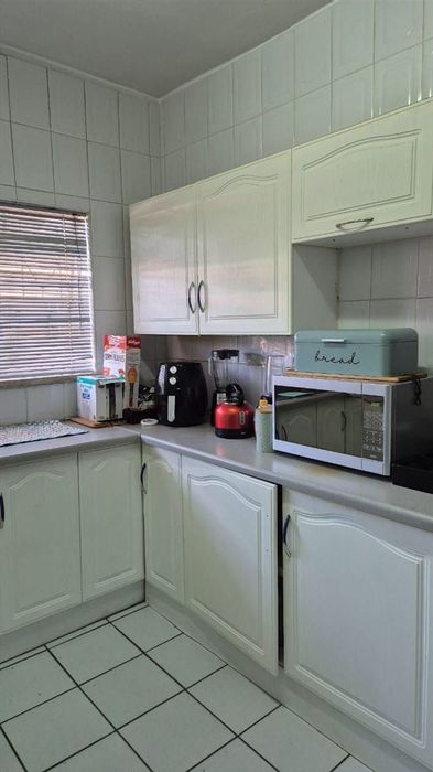 2-Bedroom Apartment For Sale in Kempton Park Central with garage and scullery.