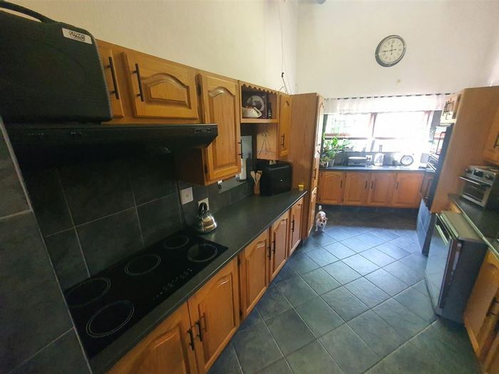 For Sale: Spacious 5-Bedroom House in Van Riebeeck Park with Pool and Garages.
