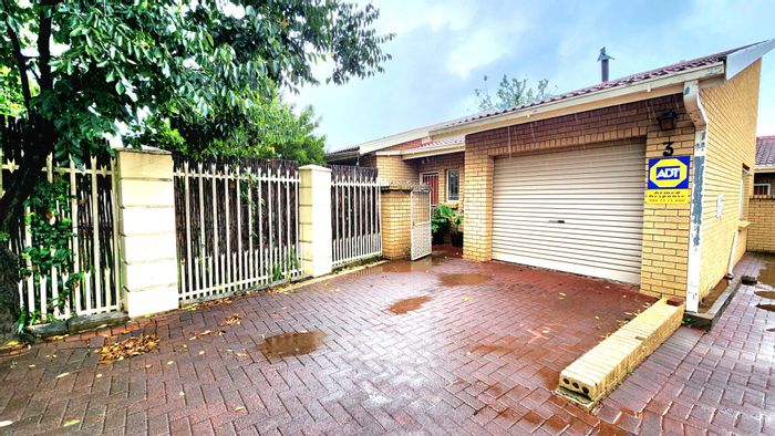 For Sale: Townhouse in Pellissier with 2 bedrooms, garage, and entertainer's backyard.