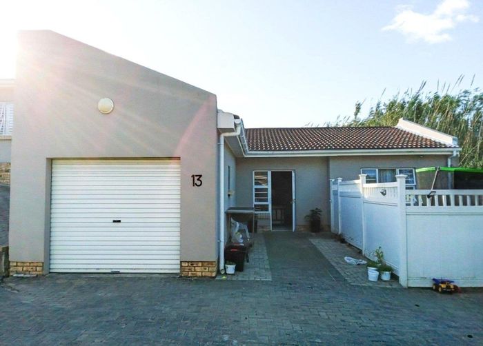 3-Bedroom House in Cambridge For Sale with garage, yard, and nearby amenities.