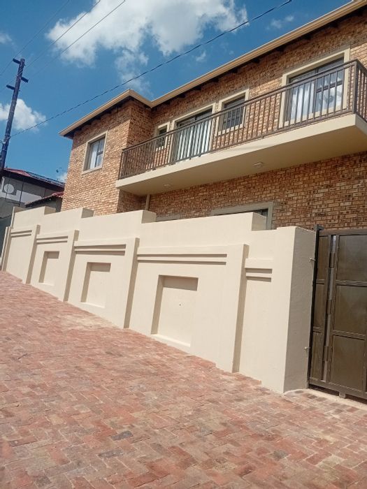 For Sale: House in Cosmo City with 10 studio apartments and 24/7 security.