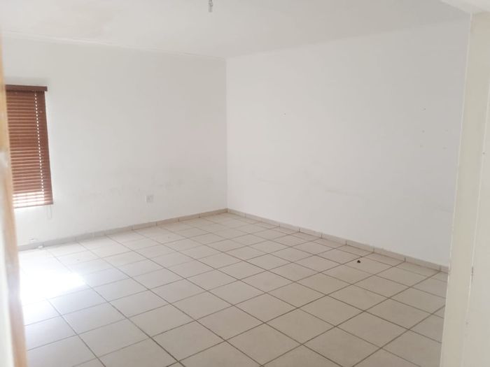 Kagiso Commercial Office Space To Rent: Large training area, kitchen, and restrooms.