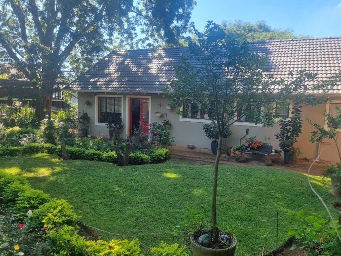 For Sale: House in Clarendon with pool, garden, and double garage.