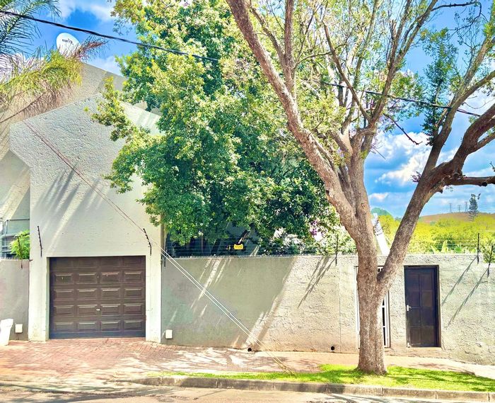 1-Bedroom Apartment in Westdene For Sale: Private courtyard, garage, rooftop hangout.