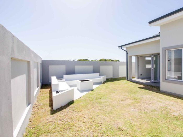 Aston Bay House For Sale: 3 beds, outdoor shower, double garage, secure living.