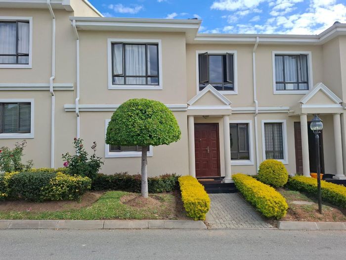For Sale: Townhouse in Carlswald Estate with private garden and secure access.