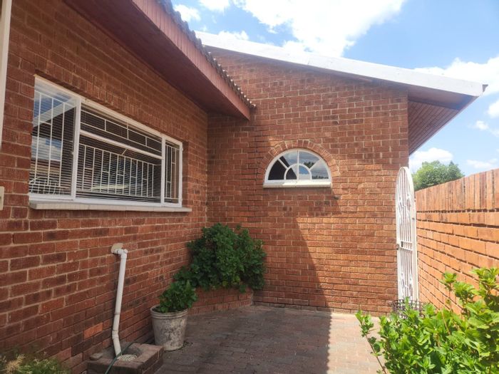 3-Bedroom Apartment To Rent in Standerton Central with secure parking and amenities.