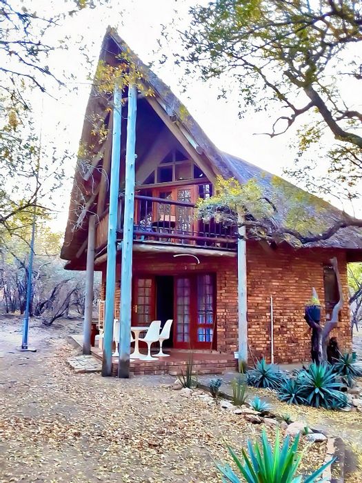 House for Sale in Marloth Park Central: 2 bedrooms, balcony, braai area, wildlife.