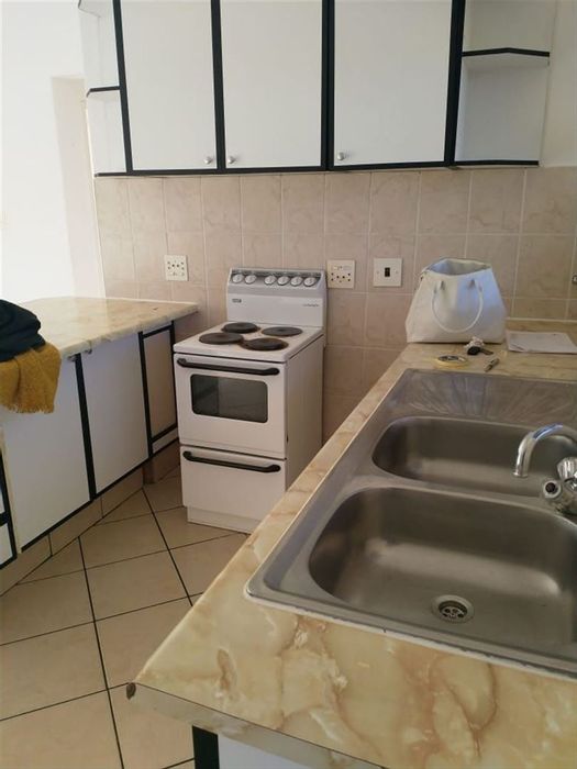 2-Bedroom Apartment For Sale in Kempton Park Central with covered parking and storage.