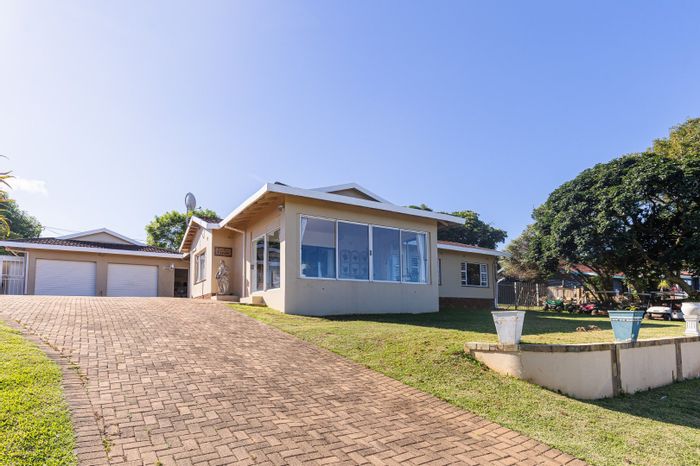 For Sale: Uvongo House with sea views, pool, and dual entertainment areas.