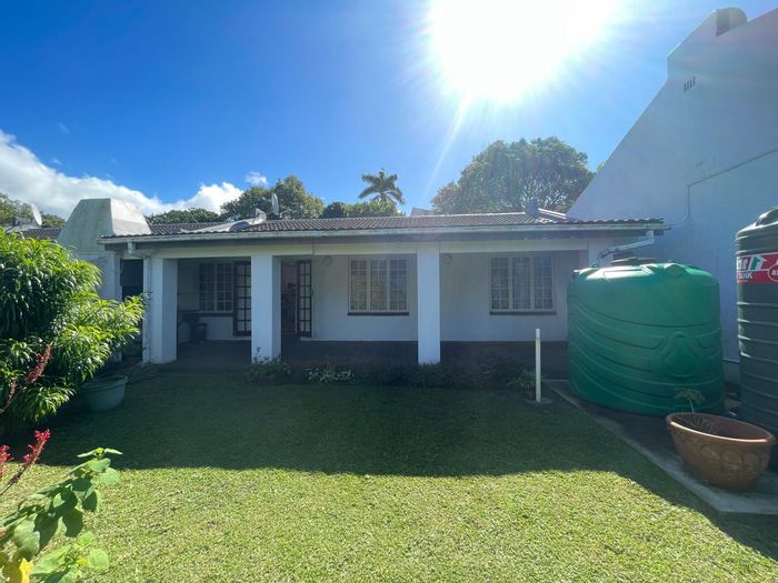 3-Bedroom Townhouse For Sale in Port Edward Central with private garden and braai area.