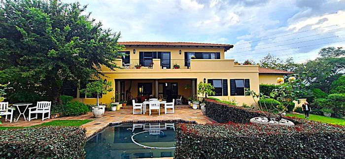 House for Sale in Maroeladal: 4 beds, pool, garden, security estate amenities.