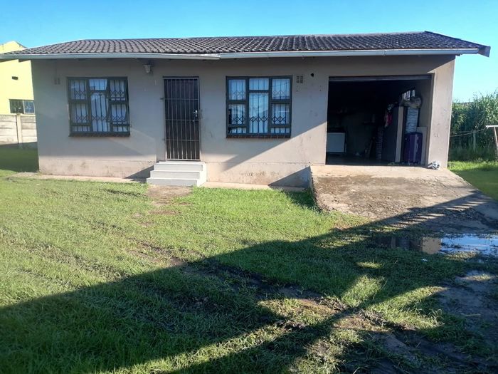 Two-bedroom house for sale in Esikhawini Central with garage and spacious yard.