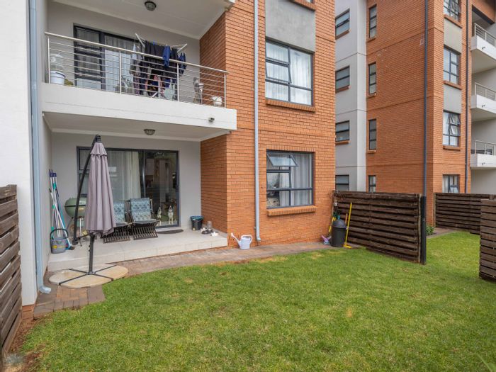 For Sale: Townhouse in Modderfontein with pool, clubhouse, and private garden.