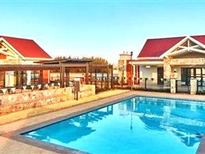 For Sale: Glen Marais Townhouse with wrap-around garden, gym, pool, and business center.