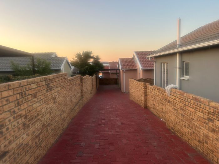 3 Bedroom House for Sale in Cosmo City with garden, carport, and 24-hour security.