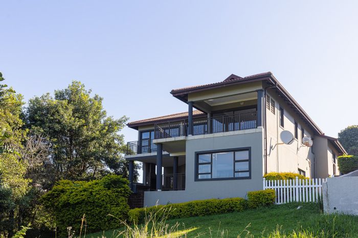 For Sale: House in Shelly Beach with pool, sea views, and double garage.